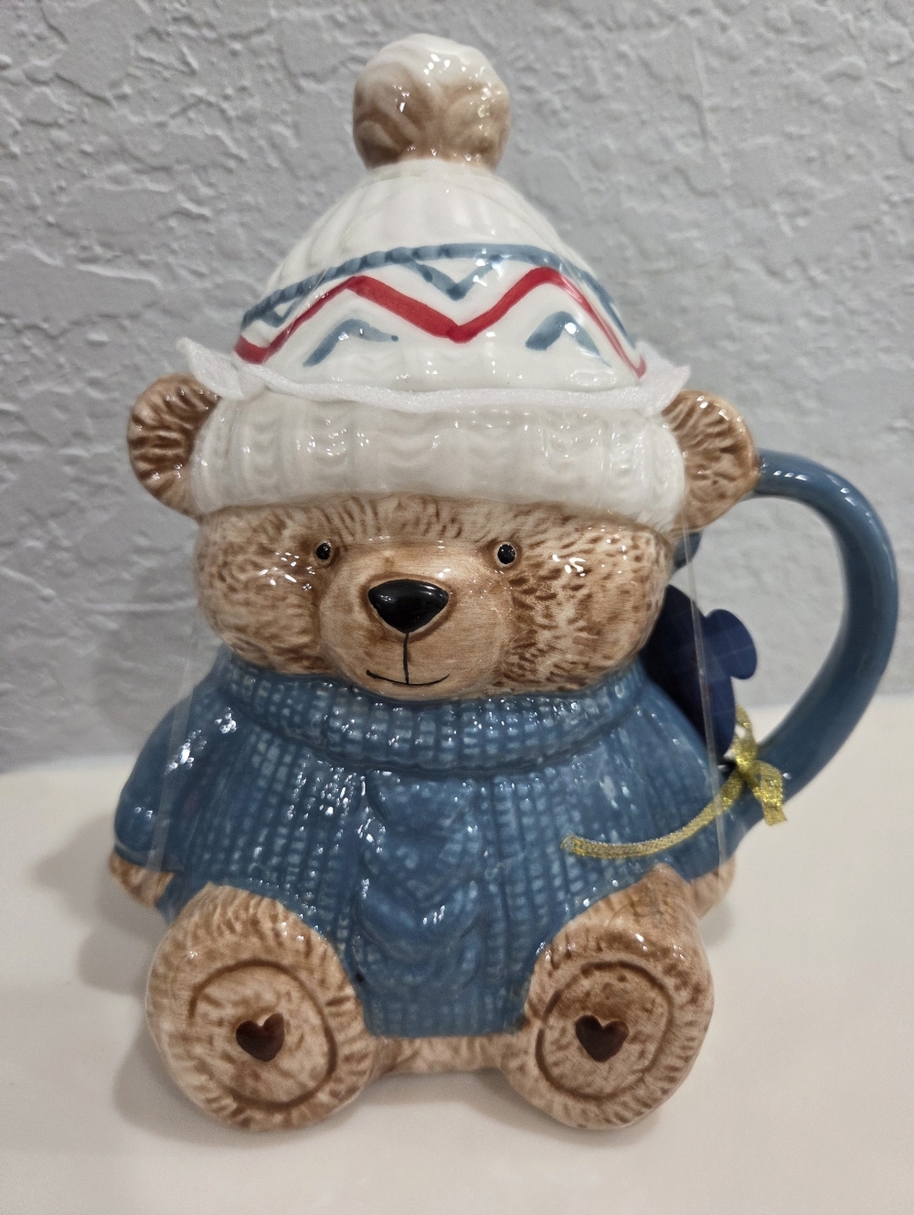Teddy Bear Mug With Blue Sweater And Tossel Cap